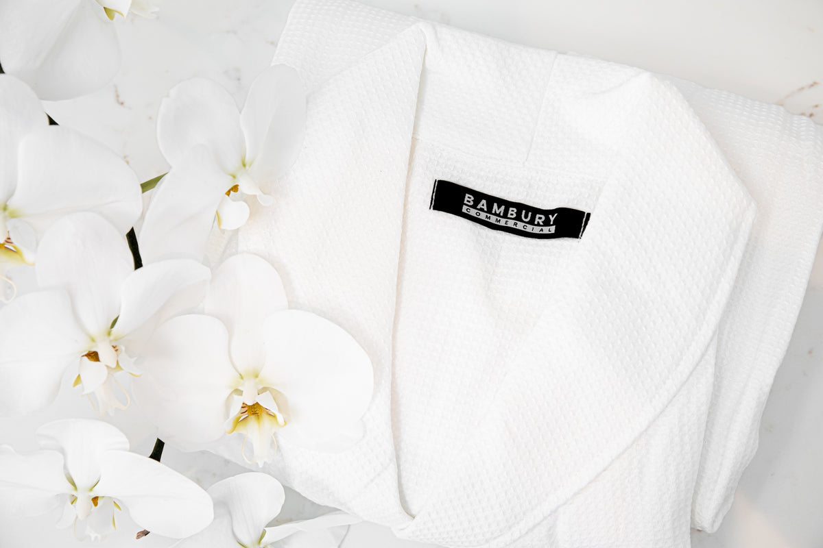 White robe with orchids 